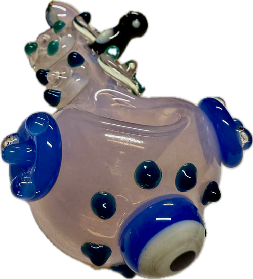 Ripkitty penguin art pipe — frosted pink body, three-quarter rear angle showing mouthpiece, penguin figures, and blue dot pattern